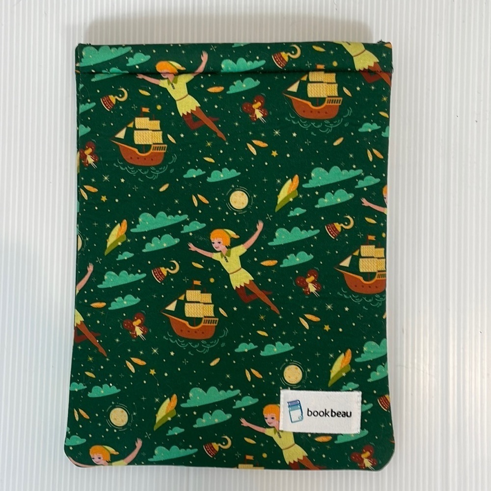 Padded tablet cover or book reader cover with Peter Pan print design
